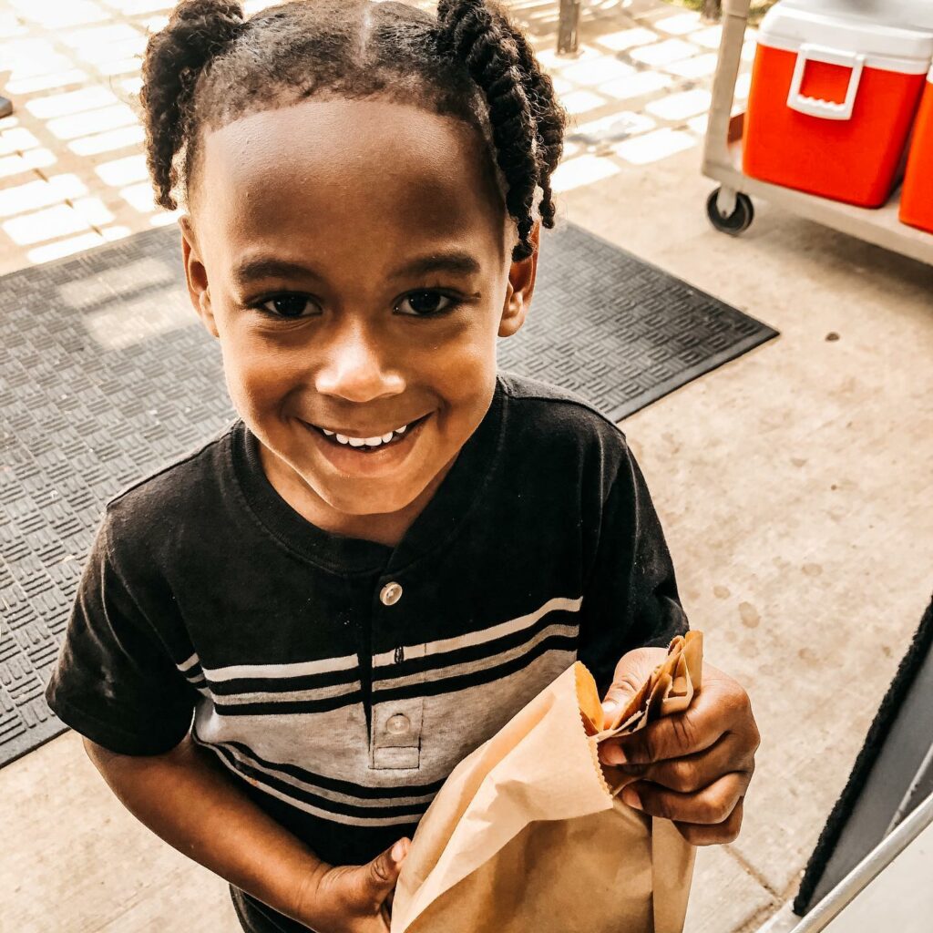 Child with Lunch Bag